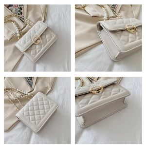 Detailed views of quilted cream shoulder bag with pearl accents and gold ring buckle