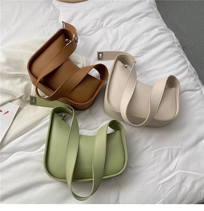 Detailed comparison of minimalist half-moon underarm bags in brown, beige, and green colors
