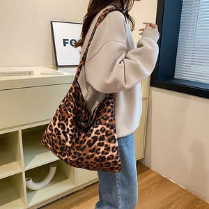 Large leopard print hobo shoulder bag with wide strap and spacious minimalist design