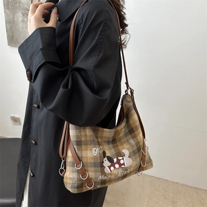Chic vintage plaid tote bag with brown leather straps and cute cartoon dog illustration