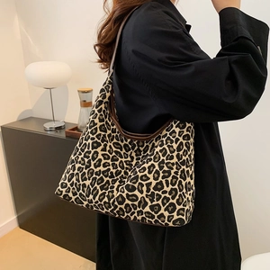 Stylish leopard print canvas Hobo tote bag with brown leather trim for daily commuting