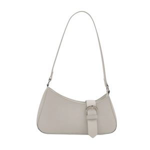 Minimalist cream crescent shoulder bag in solid faux leather with silver buckle detail