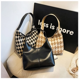 Hobo bags collection featuring minimalist black leather and stylish checkered patterns