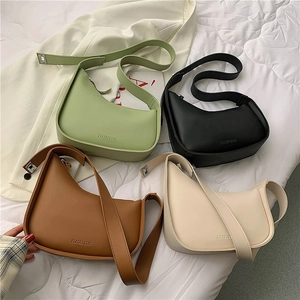 Minimalist irregular half-moon underarm bags in four colors with textured leather finish