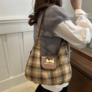 Chic autumn plaid hobo bag with vintage design and leather puppy flap detail