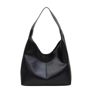 Fashionable black glossy faux leather tote bag with minimalist hobo design for women
