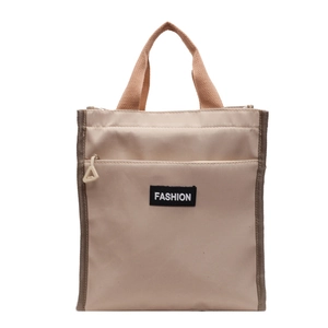 Minimalist beige waterproof lunch tote bag with fashion label and reinforced handles