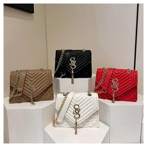 Quilted leather shoulder bags with gold SS logo and fringe charms in four colors