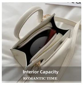 Interior view of small white crossbody bag with zipper compartment and makeup storage