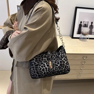 Chic black and grey leopard print shoulder bag with gold chain and metal buckle lock