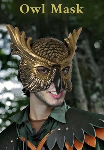 Close-up of bronze owl mask featuring detailed feather textures and 3D beak for cosplay