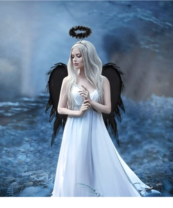 Detailed view of black angel wings and feather halo set for cosplay and party costumes