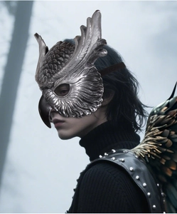 Side view of silver owl mask with realistic feather texture for masquerade cosplay
