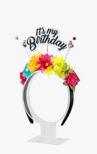 Détail d'un serre-tête d'anniversaire avec fleurs colorées et signe It's my Birthday scintillant