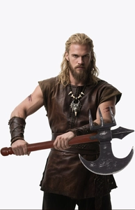 Close-up of Viking battle axe prop with realistic metallic weathering and wood texture