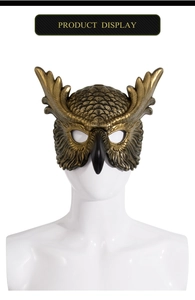 Detailed owl masquerade mask with bronze feather texture and black beak on model