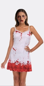 Detail of white lace slip dress with realistic red blood splatters for Halloween costume