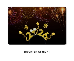 Detail view of 2026 Happy New Year headband with gold glitter stars and champagne glasses