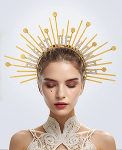 Macro detail of golden halo crown with Guest of Honor silver glitter lettering