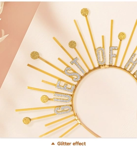 Detail of golden sunburst halo headband featuring silver glitter Guest of Honor letters