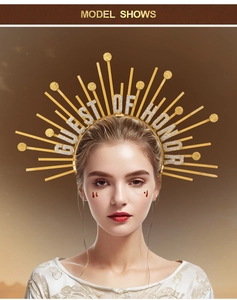 Detail of golden halo headband with Guest of Honor text and glitter starburst rays