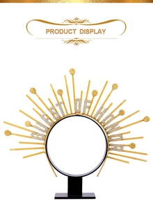 Golden sunburst halo crown featuring 'GUEST OF HONOR' glitter text on display stand