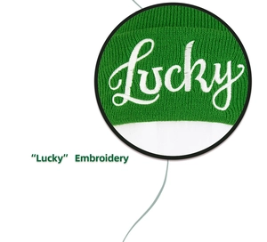 Detail showing white Lucky embroidery on a green knitted St. Patrick's Day beanie