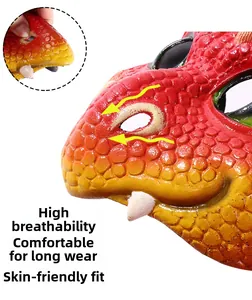 Detail of soft dragon mask showing breathable eye holes and flexible texture