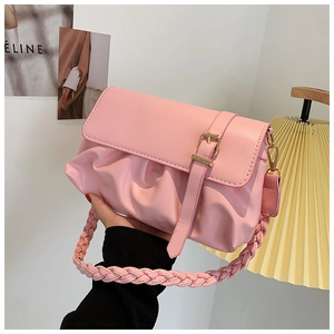 Pink pleated faux leather underarm bag with a woven handle and metallic buckle detail