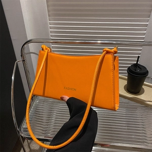 Modern orange rectangular underarm bag with Fashion print and knotted shoulder strap