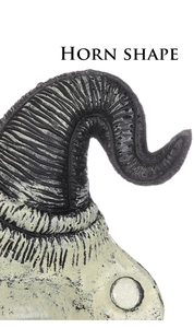Macro detail of black textured spiral ram horns on a cream PU foam devil mask