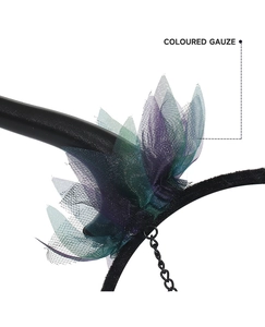Detail of fairy horn headband with colored gauze and black metal chains for cosplay