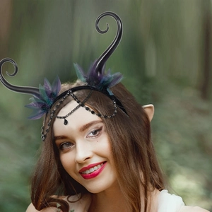 Gothic forest fairy headpiece with black horns, feathers and beaded fringe chains