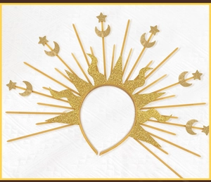 Detail of golden sun and moon headband with glittering celestial star patterns