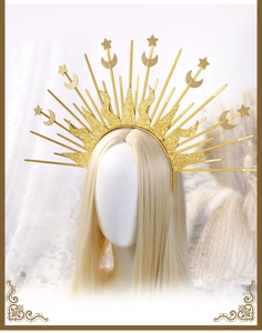 Front view of golden halo crown with sun, moon, and star elements on a headband