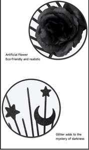 Detail of Gothic sun and moon headpiece with black artificial roses and glitter finish