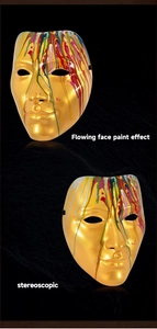 Detail of gold masquerade mask with flowing colorful paint effect and metallic texture