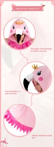 Detail of pink flamingo cape with embroidered hood crown and serrated feather hem