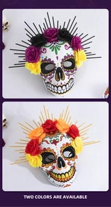 Detail of Day of the Dead EVA masks with floral decor and radiating sunburst crowns