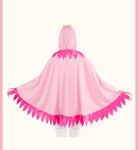 Rear view of pink hooded flamingo cape with crown detail and jagged dark pink trim