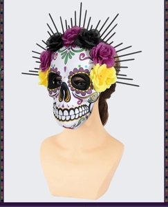 Close-up of Day of the Dead EVA skull mask with floral crown and black spikes