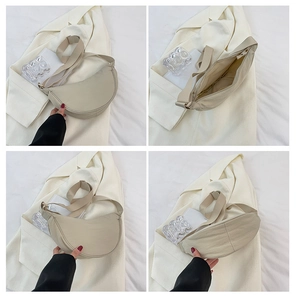 Détails du sac demi-lune crème montrant l'intérieur spacieux et la texture en nylon