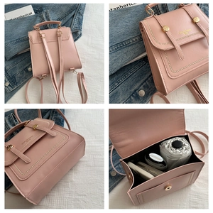 Pink multi-functional backpack detail showing large capacity for umbrella and phone