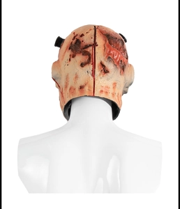 Detail view of scary zombie mask showing realistic stitching and bolt decorations