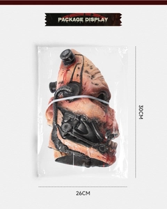 Detailed view of the Halloween zombie mask in packaging with dimensions 30cm by 26cm