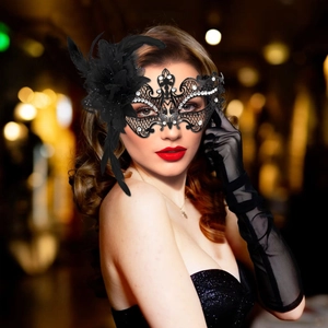 Elegant masquerade metal mask with rhinestones and black feathers for carnival party