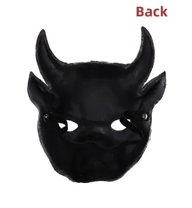 Detail view of the back of a black 3D cow mask showing the elastic strap and metal rivets