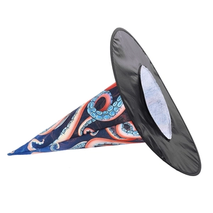 Detail of creative Halloween witch hat with blue and orange octopus tentacle prints