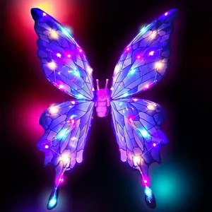 Detail showing illuminated LED butterfly wings with colorful glowing lights and bioluminescent patterns