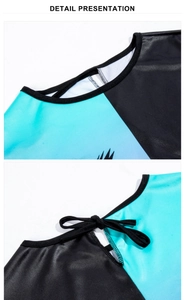 Detail of Harley Quinn cosplay cape showing silk texture, neck trim and black ribbon tie